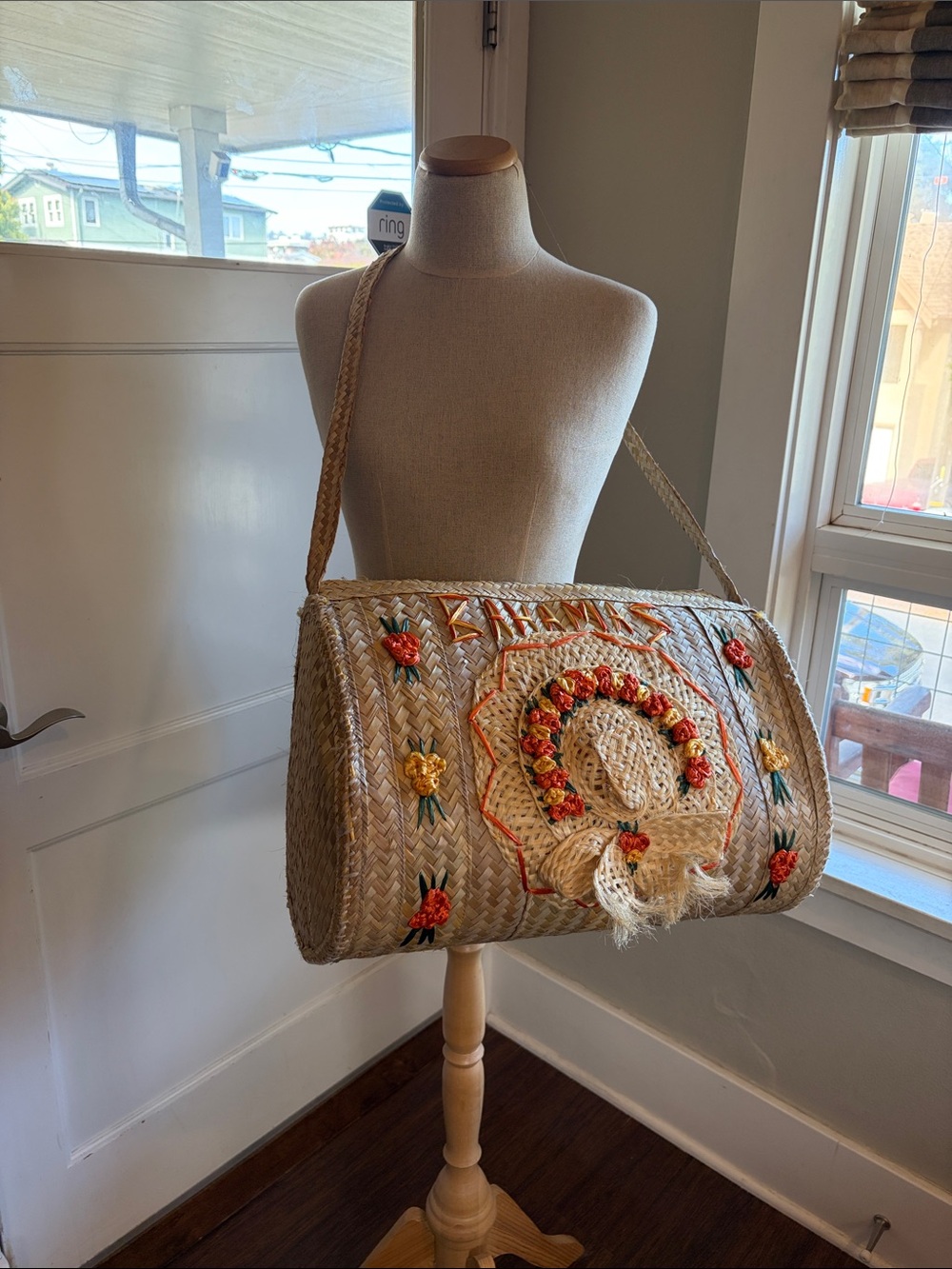Woven ‘Bahamas’ Natural Straw Barrel Bag with Embroidered Floral Accents
